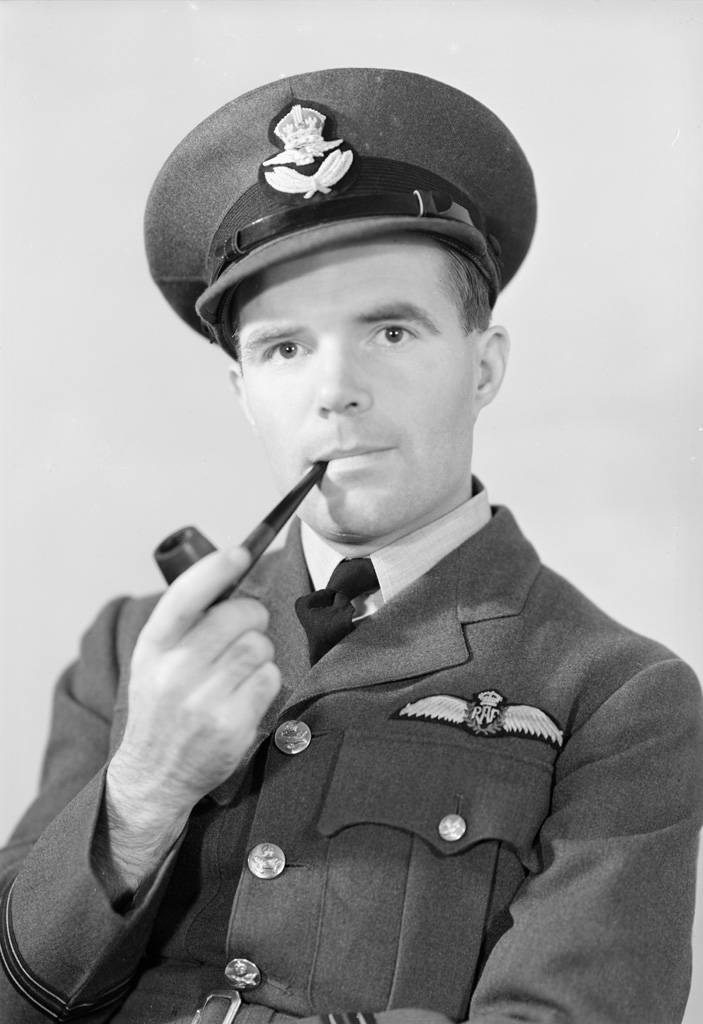 Close up of RAF Officer holding pipe.