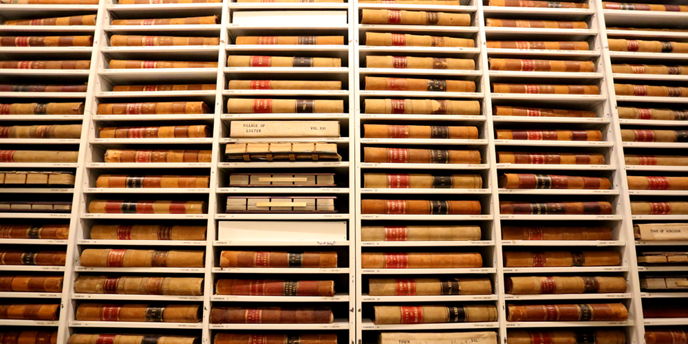 Huron County Museum. View of original school house building. Blue sky above.