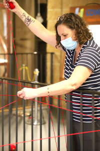 Tracey-Mae Chambers installing art project at the Museum