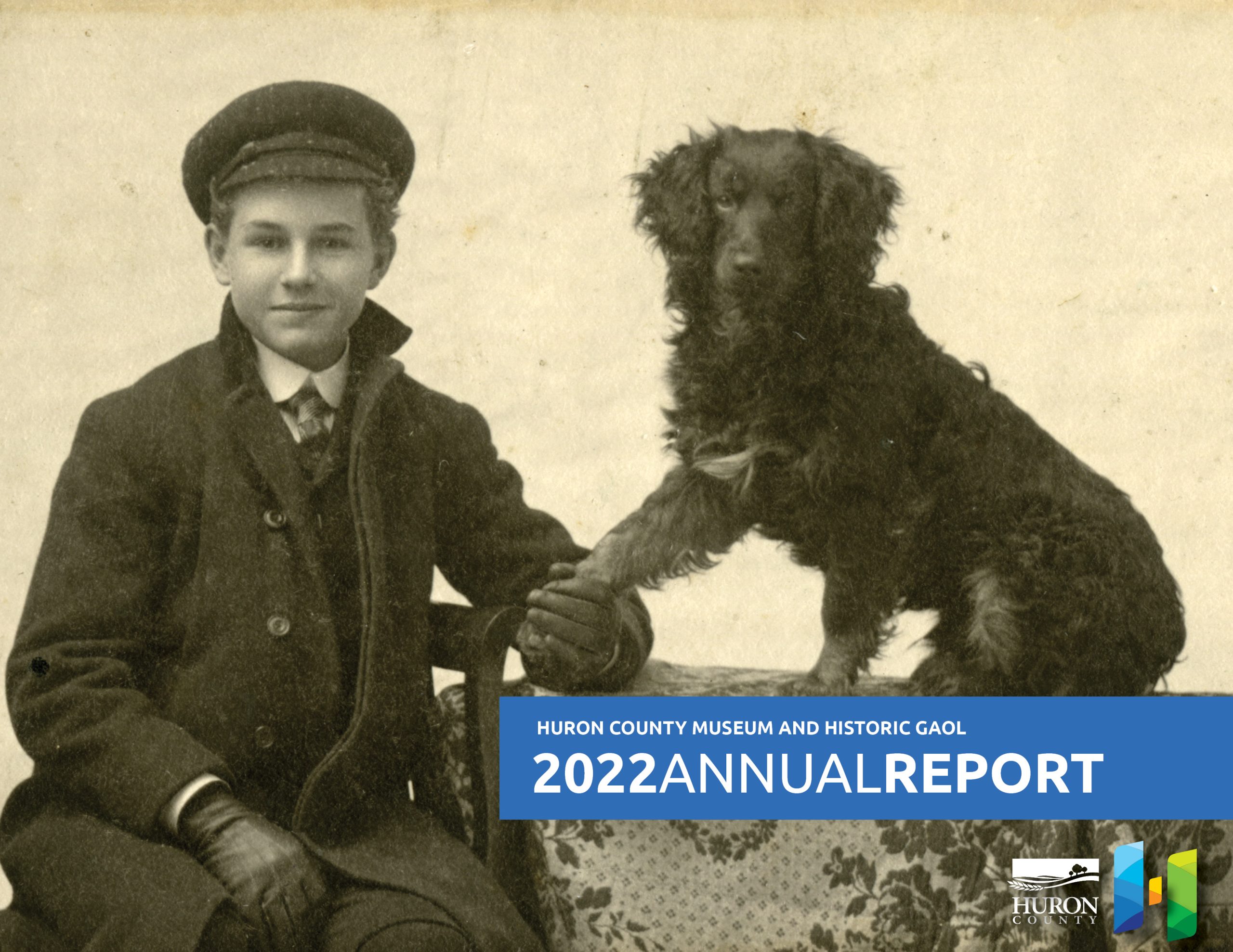 Cover image of the Museum 2022 Annual Report featuring an historic portrait image of a boy and a dog