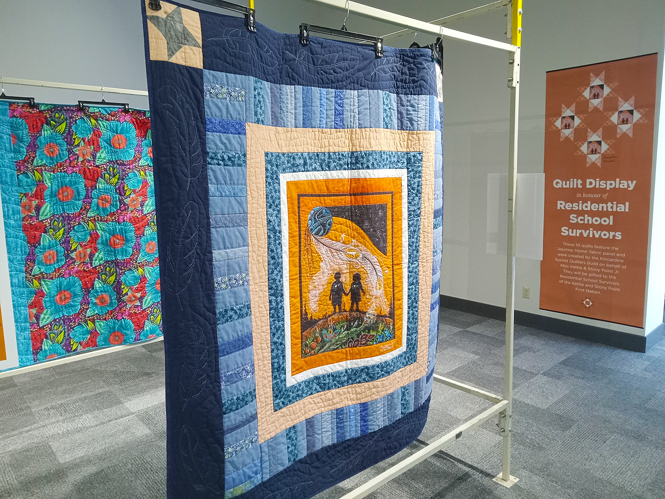 Image of a quilt hanging at the Museum