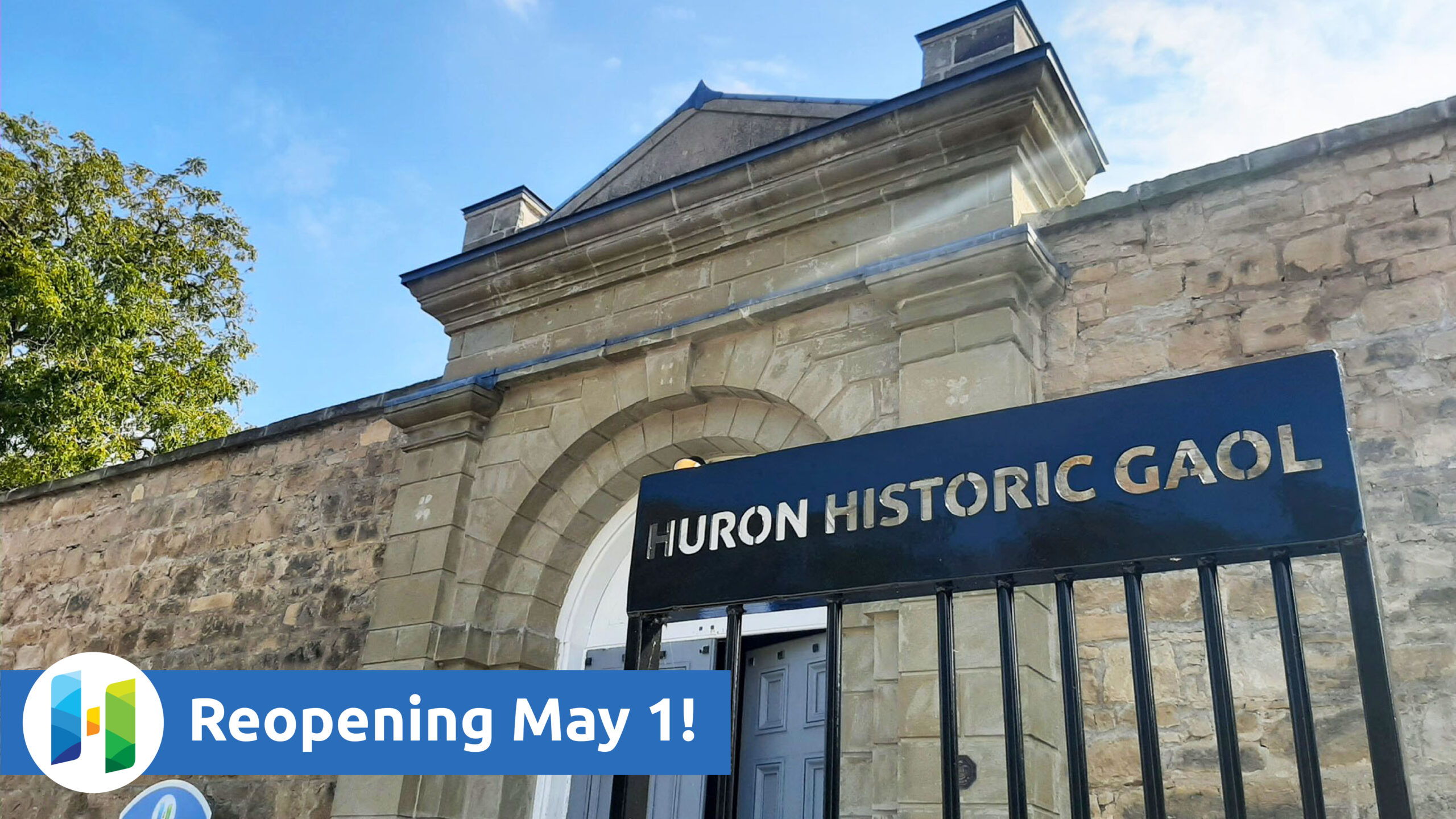 Photo of the Huron Historic Gaol with text promoting reopening May 1
